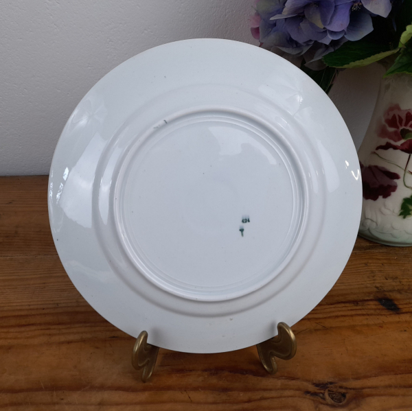 Ancienne assiette plate en faience  n°0636