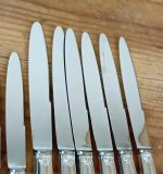 Lot de 12 couteaux en métal argenté n°11512