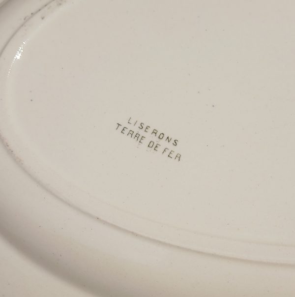 Ancien plat ovale terre de fer Liserons n°12081